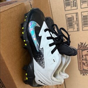 Nike Kids Black and White Cleats with Iridescent Swoosh